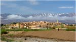 028. Leaving Midelt, with the Atlas mountains in the background